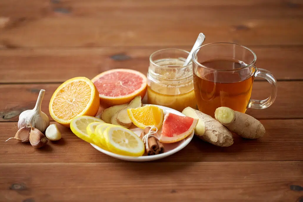 Picture of several home remedies for allergies such as honey, citrics and teas