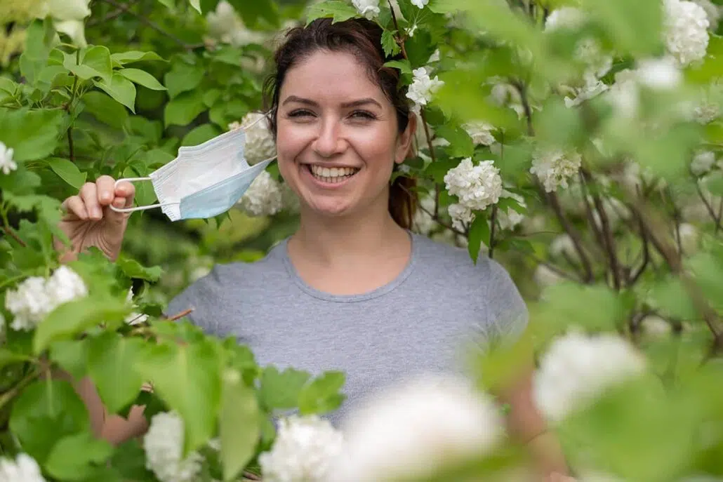 Some lifestyle adjustments for seasonal allergies include wearing a face mask outdoors, limiting time spent outdoors, and investing in an air purifier to help filter out allergens in the home