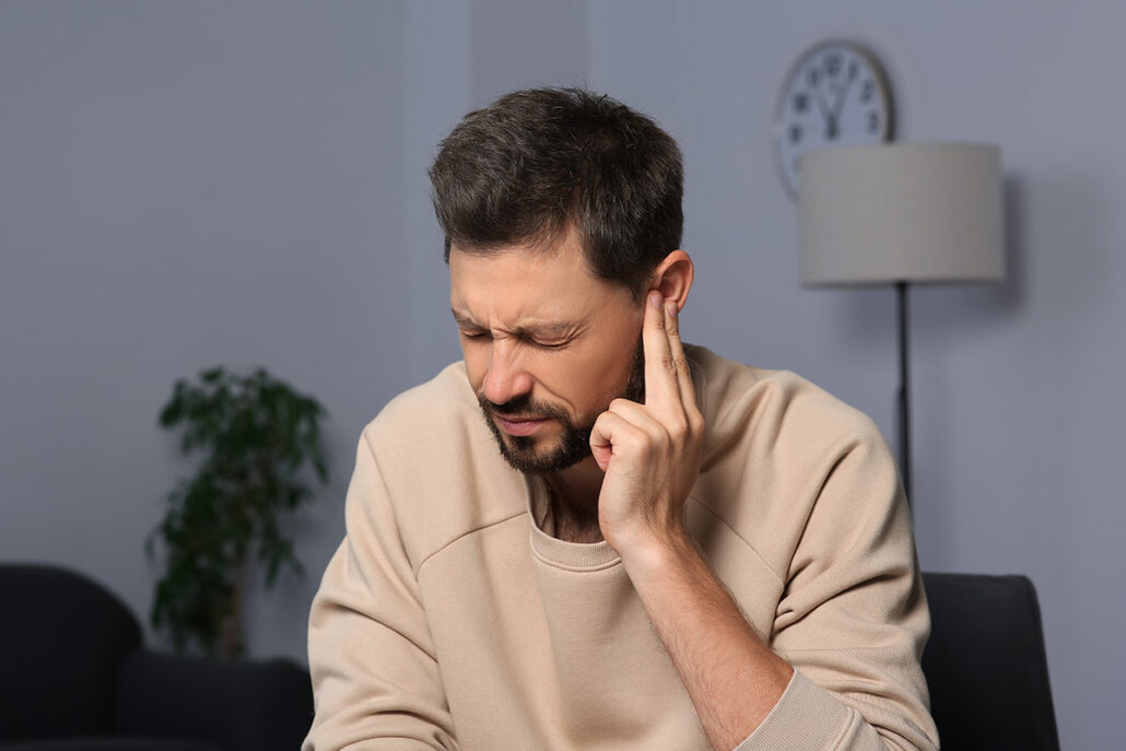 Male patient with ear pain due to allergies.