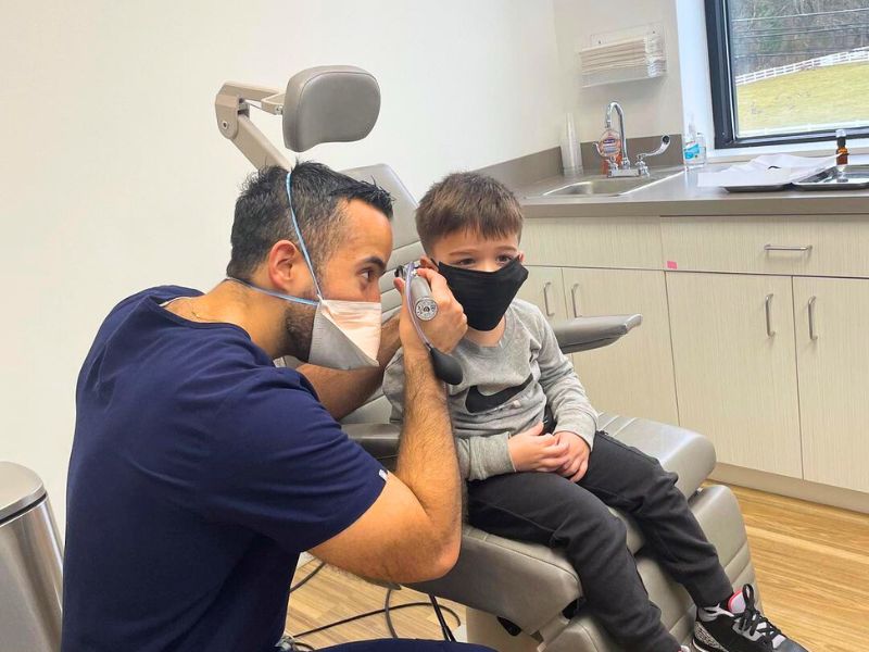 ENT proffesional with children