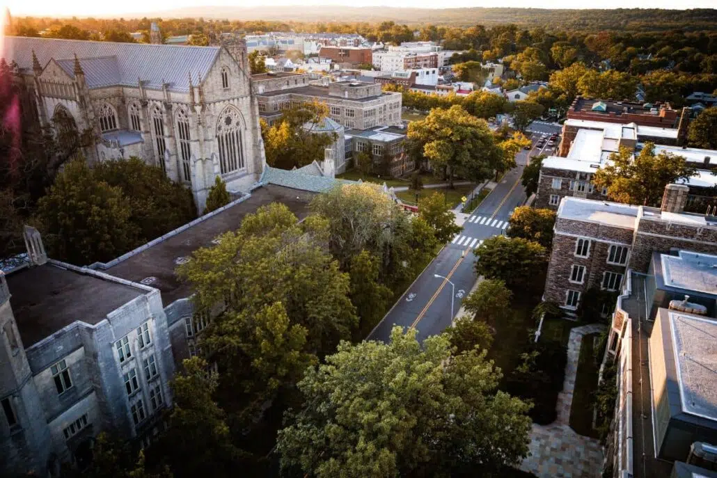 Tree-lined streets and historic buildings in Princeton surrounded by mature trees during peak spring pollen season.
