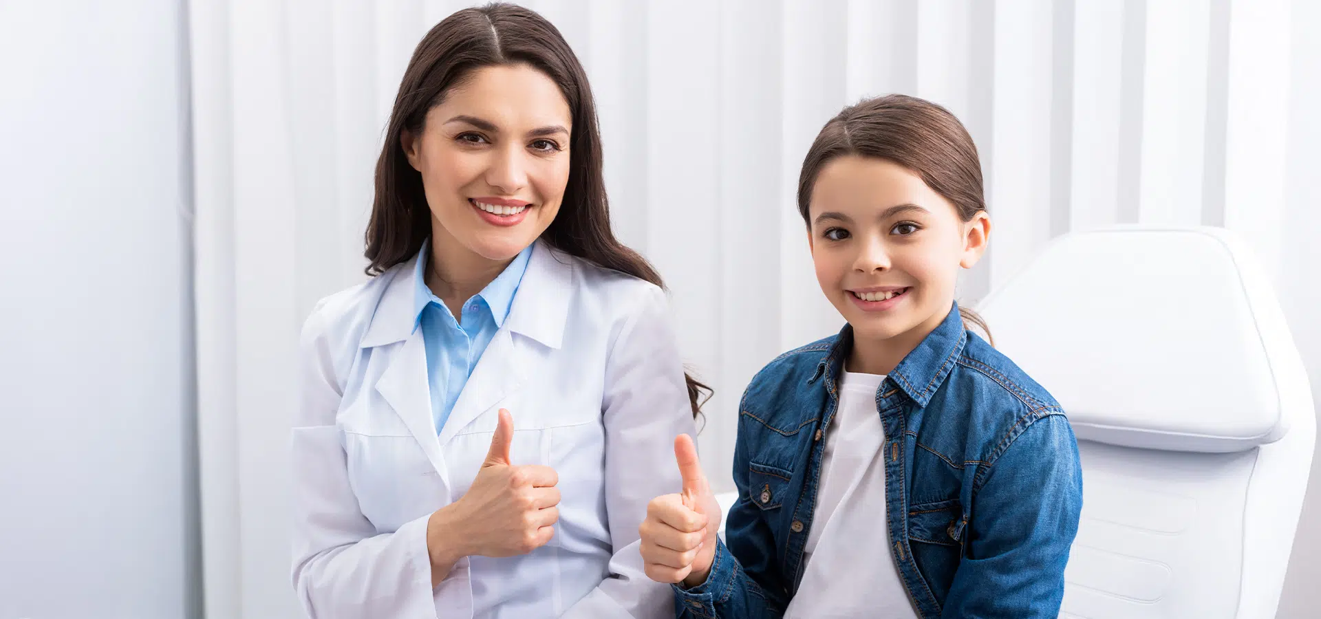 Smiling ENT doctor and young patient giving thumbs up, representing trusted ear infection care at Becker ENT clinics