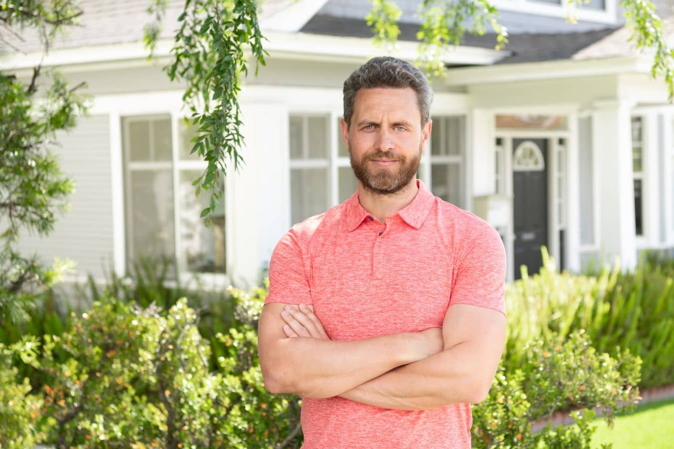 Man standing outside Hamilton NJ home, representing local air quality and its connection to sinus wellness