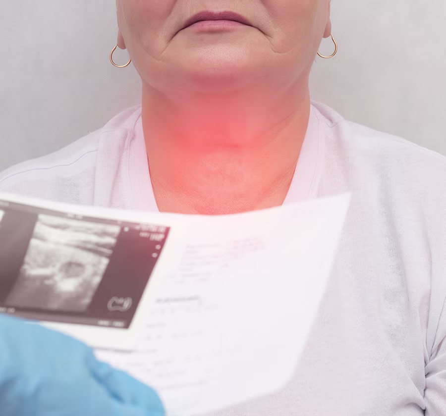 Patient reviewing neck ultrasound results during evaluation and treatment planning for branchial cleft cysts.